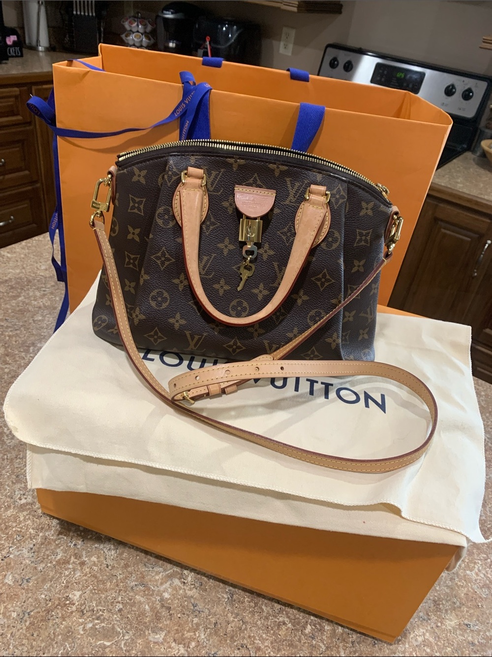 Authentic Louis Vuitton Rivoli NV PM Monogram